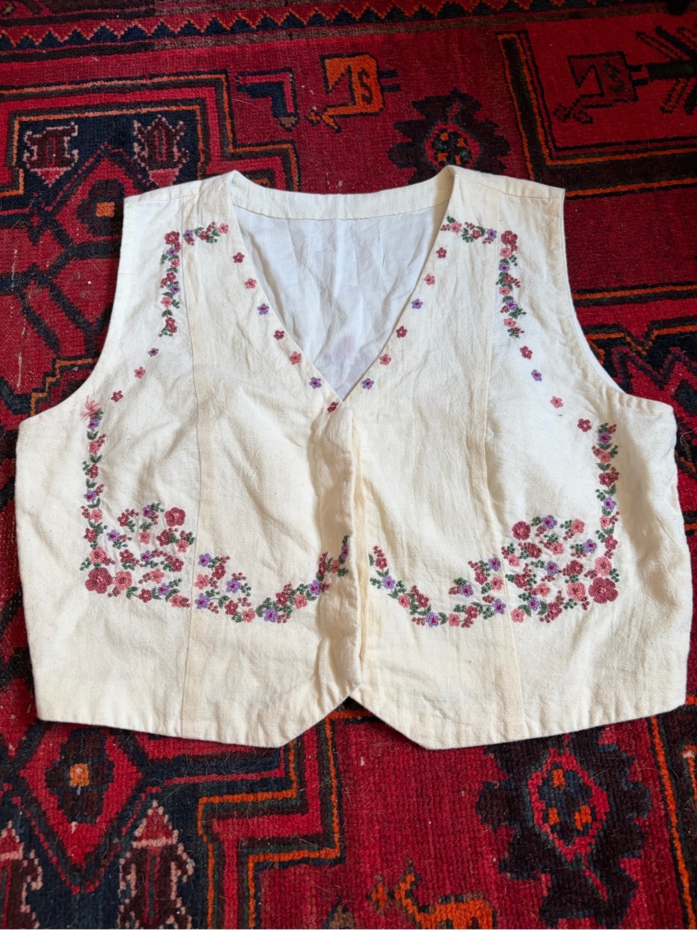 Floral embroidered button down vest
